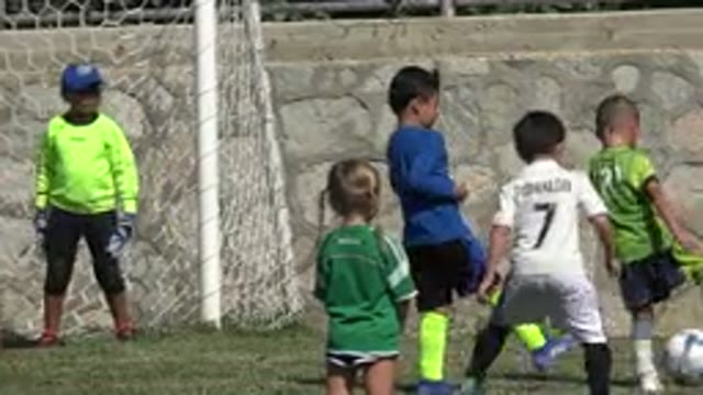 SAN JOSE DEL CABO MEXICO-2019: Kids Playing Soccer During A Sunny Day In The
