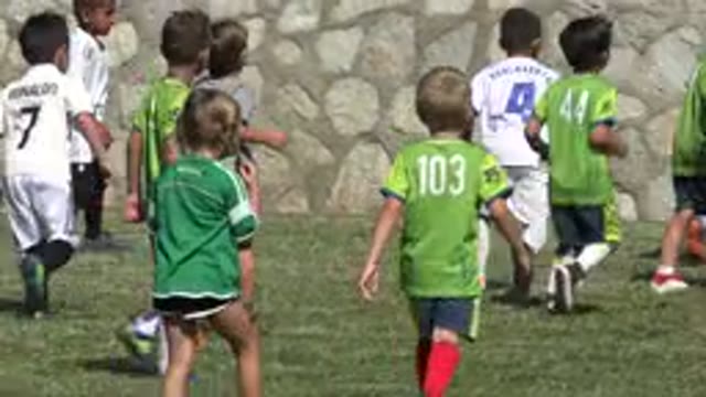 SAN JOSE DEL CABO MEXICO-2019: Kids In Colorful Dresses Playing On Grass