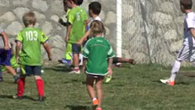 SAN JOSE DEL CABO MEXICO-2019: Small Children Playing Football and a Small Girl