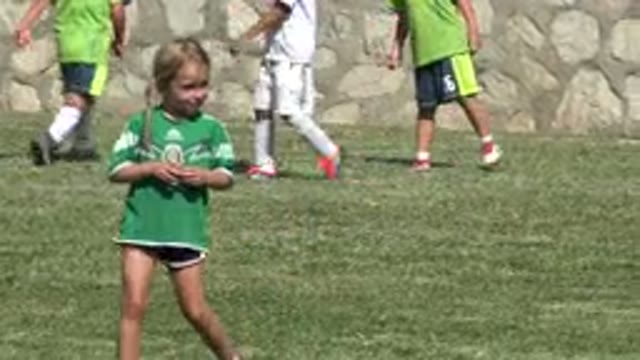 SAN JOSE DEL CABO MEXICO-2019: A Little Boy and Girl in Green and White Dresses Playing