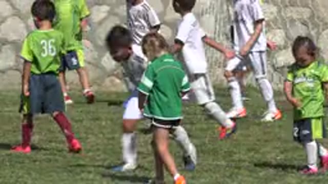 SAN JOSE DEL CABO MEXICO-2019: Little Kids Playing Soccer And The Girls Talking
