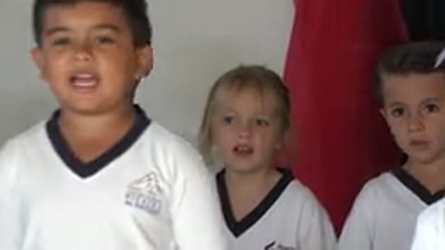 SAN JOSE DEL CABO MEXICO-2019: Kids In Soccer Uniforms Singing A Song At A Ceremony