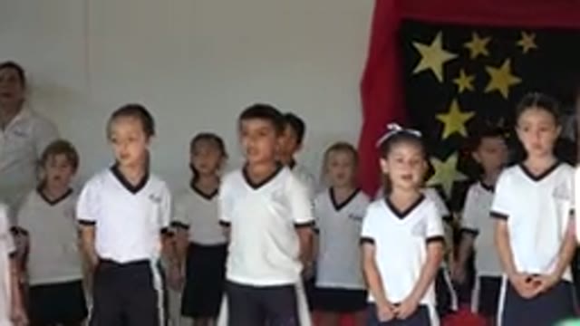 SAN JOSE DEL CABO MEXICO-2019: Kids In Uniforms On A Stage Singing A Song