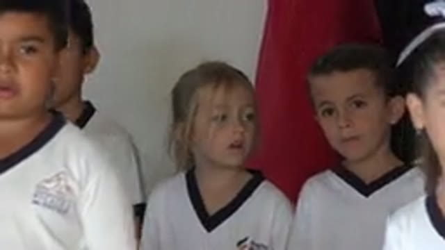 SAN JOSE DEL CABO MEXICO-2019: Uniformed Children In White Clothes Singing At School