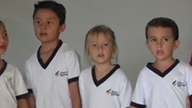 SAN JOSE DEL CABO MEXICO-2019: Little Kids In Uniforms Standing In A Line And Singing