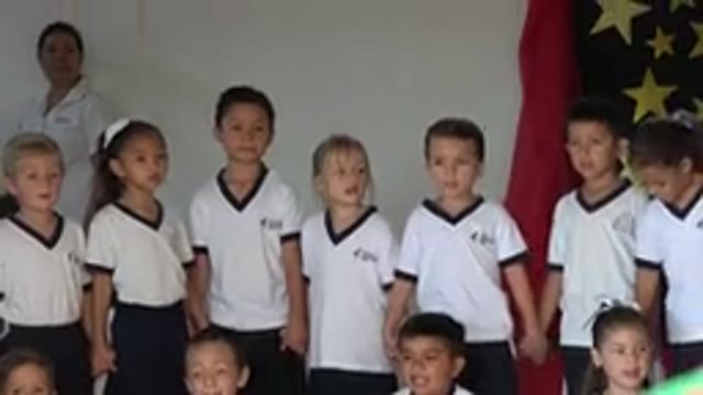 SAN JOSE DEL CABO MEXICO-2019: A Group Of Boys And Girls Wearing White Clothes Singing Outside