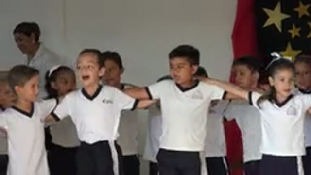 SAN JOSE DEL CABO MEXICO-2019: Children Wearing School Uniform Singing Together