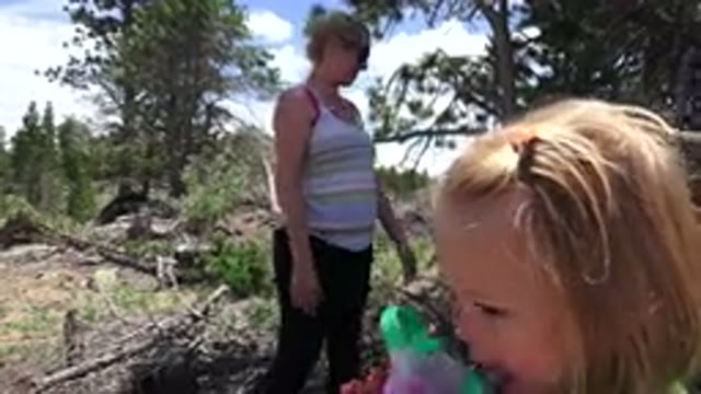WESTMINSTER COLORADO-2016: Girl Wearing Green Shirt Drinks From White Skippy Cup
