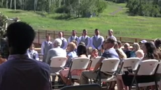 MESA COLORADO-2016: A Group Of People Sitting In Chairs On A Piece Land With