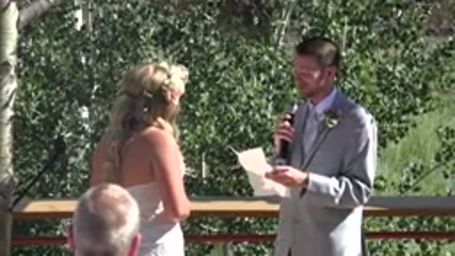 MESA COLORADO-2016: Husband Reading A Speech For His Bride At Their Wedding