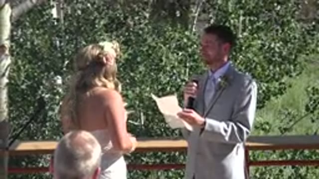 MESA COLORADO-2016: Bride And Groom At Altar With Man Reading Vows