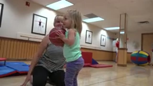 WESTMINSTER COLORADO-2016: Cute Toddler And Mom Playing Catch Together In A Gym