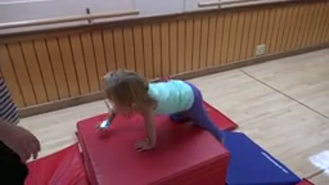 WESTMINSTER COLORADO-2016: Cheerful Child Going Through An Obstacle In A Gym
