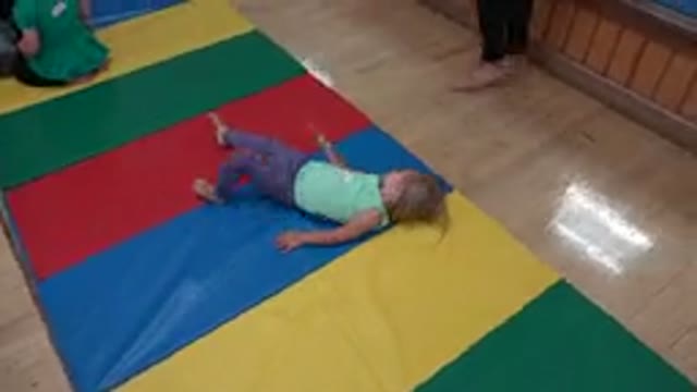WESTMINSTER COLORADO-2016: Children Play And Have Fun Rolling On Colorful Carpet