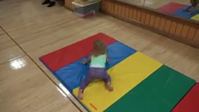WESTMINSTER COLORADO-2016: Little Girl Playing With Parents In Playroom