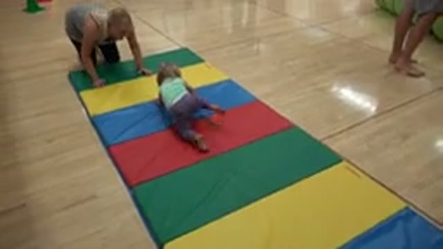 WESTMINSTER COLORADO-2016: Little Girl Crawls on a Colored Mat