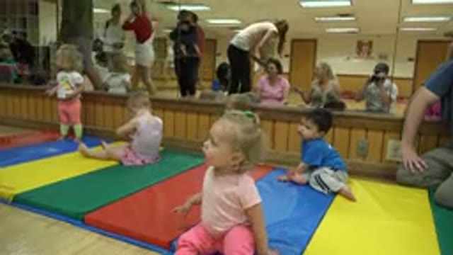 WESTMINSTER COLORADO-2016: Teacher Passing Out Stickers To Children In The Class