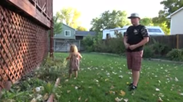 WESTMINSTER COLORADO-2016: Two Small Children Playing, One Dropping Object