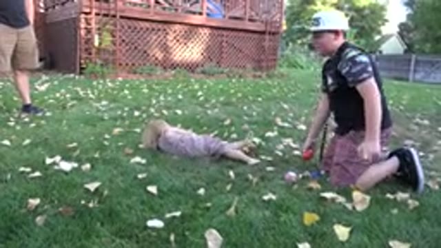 WESTMINSTER COLORADO-2016: Children Playing Together On The Grass Of The House