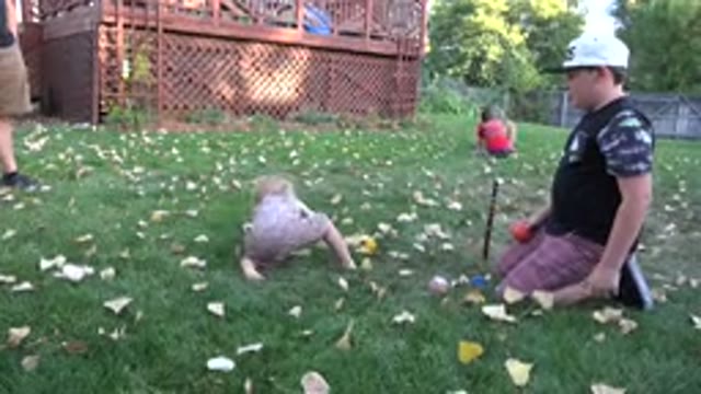 WESTMINSTER COLORADO-2016: Kid Plays With Dog While Mother Drinks in Garden