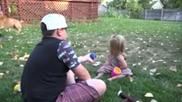 WESTMINSTER COLORADO-2016: Boy Hands Little Girl Blue Croquet Ball While Man And