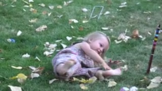 WESTMINSTER COLORADO-2016: A Little White Girl Rolling and Playing on Green Grass