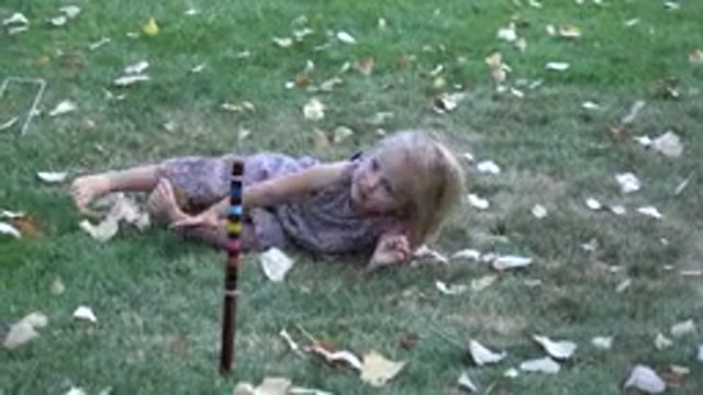 WESTMINSTER COLORADO-2016: Kid Plays Alone on Green Grass on Sunny Summer Day
