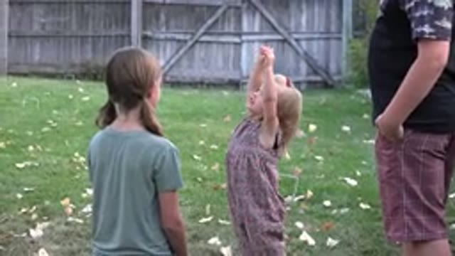 WESTMINSTER COLORADO-2016: Two Little Girls, Man, and Dog Playing in Garden