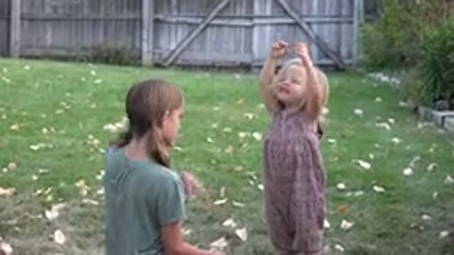 WESTMINSTER COLORADO-2016: Young Kids Playing With Each Other In The Grass In A