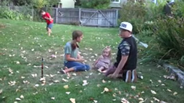 WESTMINSTER COLORADO-2016: Children Playing In The Garden And A Dog That Follows