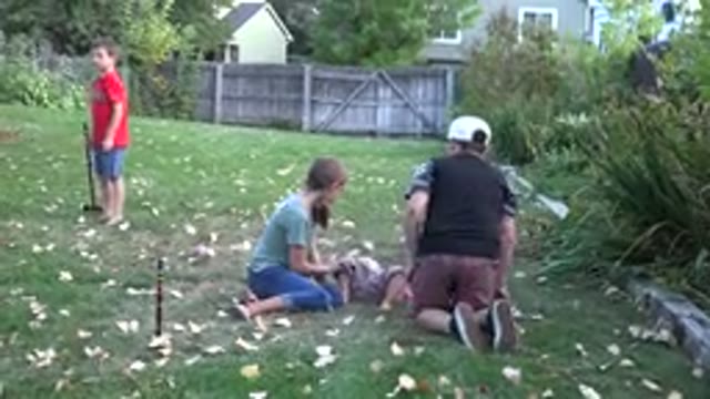 WESTMINSTER COLORADO-2016: Children Playing On The Backyard On A Autumn Scenery