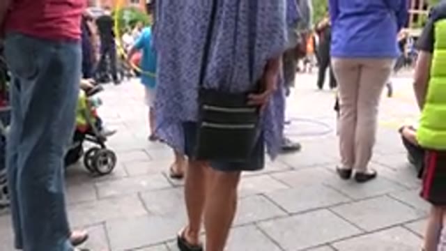GRAND JUNCTION COLORADO-2017: Curious Crowd Watching Street Entertainers In Plaza