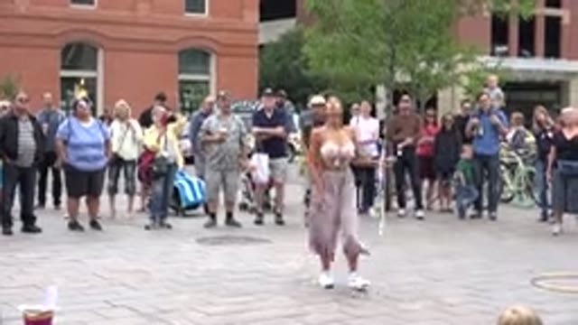 GRAND JUNCTION COLORADO-2017: Woman Juggles Hoops In Front Of Audience