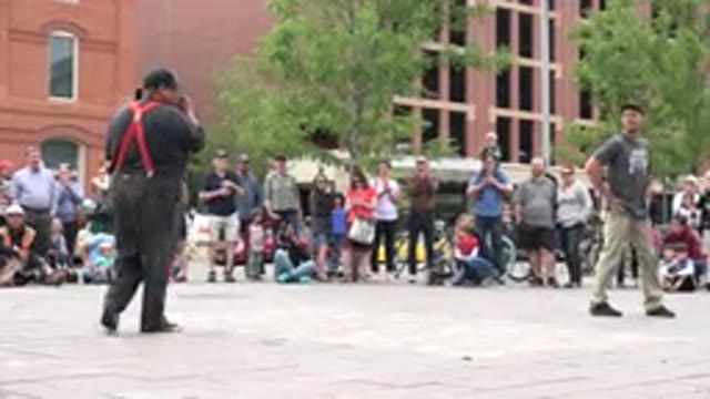 GRAND JUNCTION COLORADO-2017: Dancers Performing In The Street On A Sunny Day