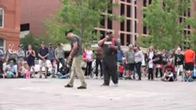 GRAND JUNCTION COLORADO-2017: People Standing In A Crowd Watching Dancers In A