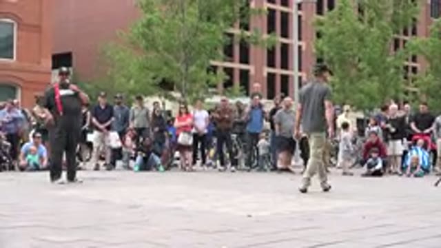 GRAND JUNCTION COLORADO-2017: Two Men Performing Dance On The Street While