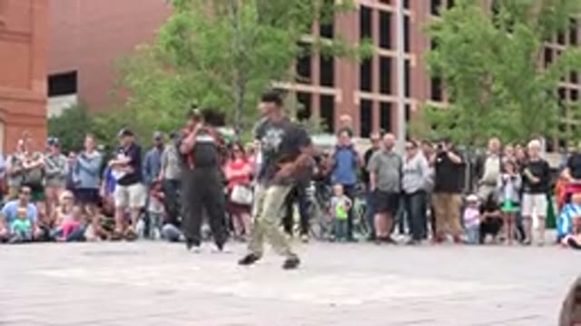 GRAND JUNCTION COLORADO-2017: A Dancing Man While People Gather Around To Watch