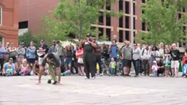 GRAND JUNCTION COLORADO-2017: A Man Dances Hip Hop Style In Front Of A Large Group