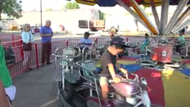 GRAND JUNCTION COLORADO-2017: Circus Kids Play In A Carousel Space Happy Blonde