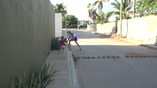 GRAND JUNCTION COLORADO-2017: Woman With Kid And Dog Walking On Footpath