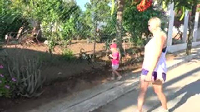 GRAND JUNCTION COLORADO-2017: Mother And Child With Panda Hat Walk Around The Zoo