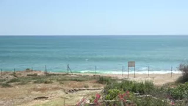 GRAND JUNCTION COLORADO-2017: Beach And Shore And Ocean With Waves Crashing