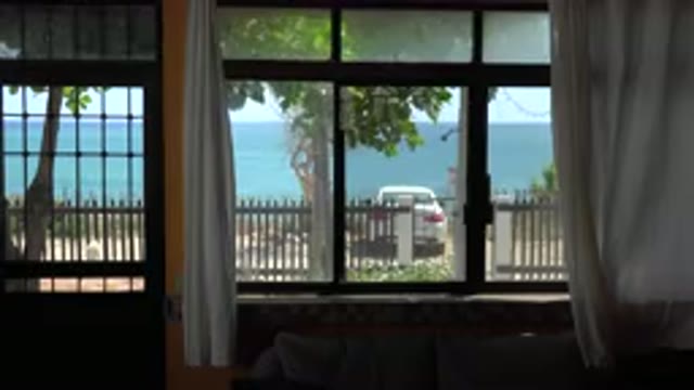 GRAND JUNCTION COLORADO-2017: Beautiful Sunny Beach View From Safety Of Inside