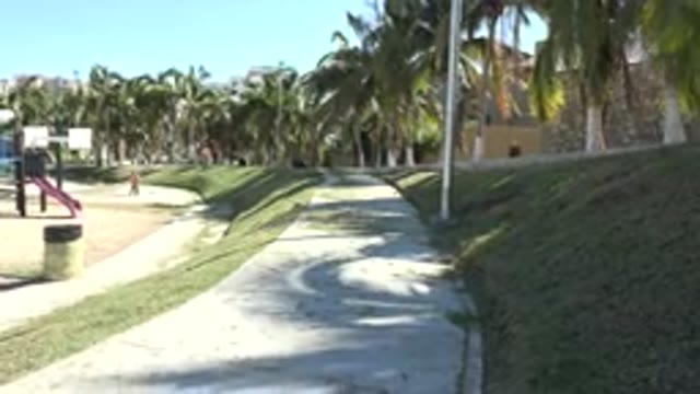 GRAND JUNCTION COLORADO-2017: Child Leaves Lonely Tropical Inspired Playground