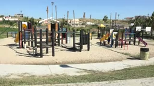 GRAND JUNCTION COLORADO-2017: Children Playing On A Bright Sunny Day At The