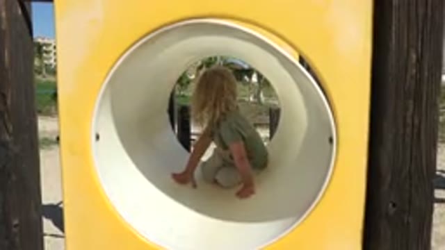 GRAND JUNCTION COLORADO-2017: Little Kid Trying To Hide From Their Parents On Playground