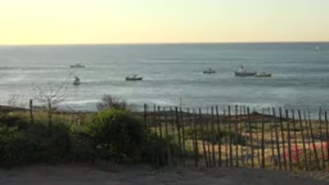 GRAND JUNCTION COLORADO-2017: Ocean View From The Beach With Fishing Boats At