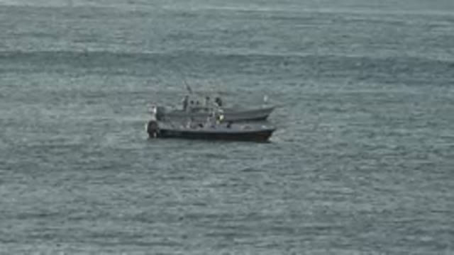 GRAND JUNCTION COLORADO-2017: People On Boats Out On Ocean Water Letting The