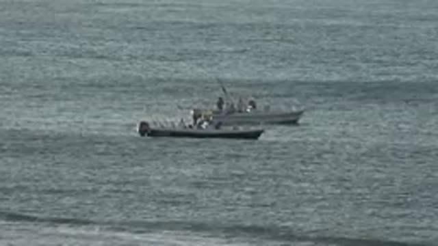 GRAND JUNCTION COLORADO-2017: Fishing Boats Out At Sea Catching Fish In Waves
