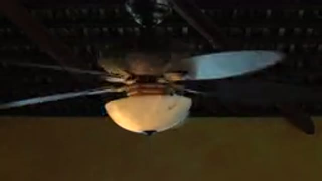 GRAND JUNCTION COLORADO-2017: Yellow And Brown Spinning Ceiling Fan Light